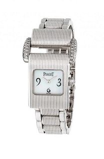 * An 18 Karat White Gold and Diamond Ref. 5222 'Miss Protocole' Wristwatch, Piaget, 50.00 dwts.