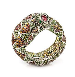 A Silver, Multicolored Garnet and Tourmaline Snake Motif Bangle Bracelet, Andrea Molinari, 70.80 dwts.