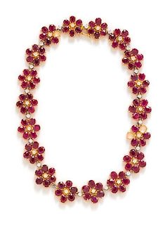 A Bicolor Gold, Diamond and Ruby Cluster Necklace, 87.10 dwts.