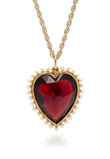 * A Yellow Gold, Garnet and Seed Pearl Heart Shape Pendant, 8.70 dwts.