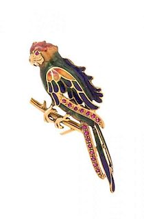 * An 18 Karat Yellow Gold, Ruby and Polychrome Enamel Parrot Brooch, 6.40 dwts.