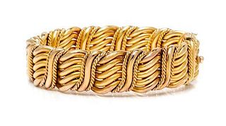 * An 18 Karat Yellow Gold Bangle Bracelet, 25.00 dwts.