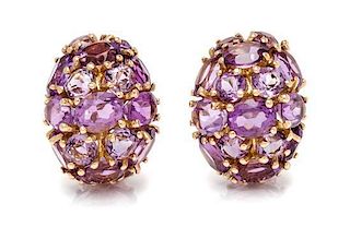 A Pair of 14 Karat Yellow Gold and Amethyst Earclips, 13.40 dwts.