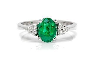 An 18 Karat White Gold, Emerald and Diamond Ring, 3.00 dwts.