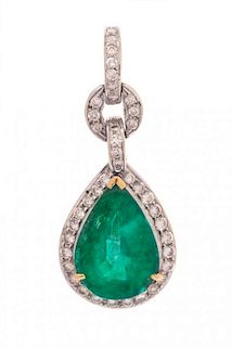 A White Gold, Emerald and Diamond Pendant, 4.10 dwts.
