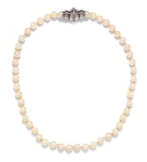 A 14 Karat White Gold, Diamond and Cultured Pearl Necklace, 33.50 dwts.