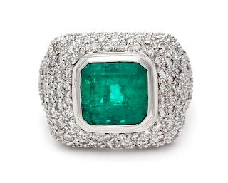 A White Gold, Emerald and Diamond Ring, 10.30 dwts.