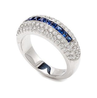 An 18 Karat White Gold, Sapphire and Diamond Ring, 5.50 dwts.