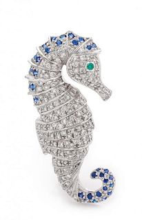 A Platinum, Diamond, Sapphire and Emerald Seahorse Brooch, 3.60 dwts.