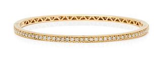 An 18 Karat Yellow Gold and Diamond Bangle Bracelet, 7.60 dwts.