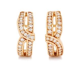 A Pair of 14 Karat Yellow Gold and Diamond Half Hoop Earclips, 6.70 dwts.