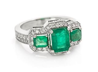 A 14 Karat White Gold, Emerald and Diamond Ring, 4.40 dwts.