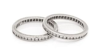 A Pair of Platinum and Diamond Eternity Bands, 3.80 dwts.