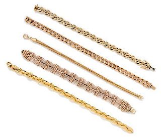 * A Collection of Gold Link Bracelets, 76.20 dwts.