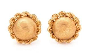A Pair of 14 Karat Yellow Gold Earclips,
