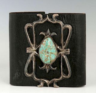 A TUFA CAST NAVAJO STERLING AND TURQUOISE KETOH