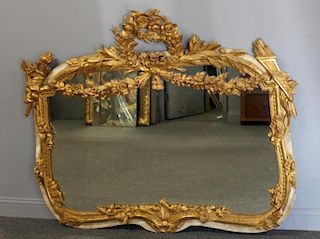 Magnificent Highly Carved Antique Giltwood Mirror.