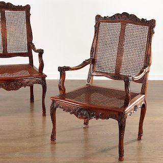 French Regence style caned walnut fauteuils