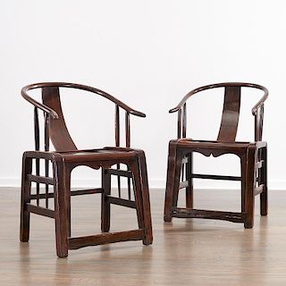 Pair Chinese hardwood horseshoe armchairs