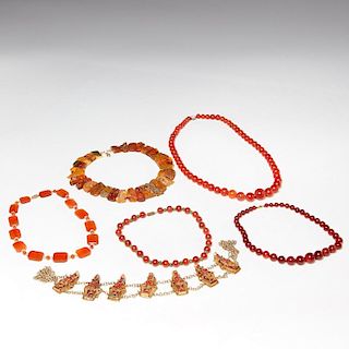 Amber, carnelian, coral, and jade necklace group