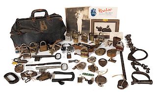 The Great Kolar’s Collection of Padlocks, Cuffs, and Other Items.