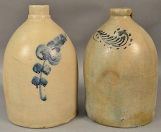 Two 2 gallon stoneware jugs, one marked Edmunds, each with cobalt blue (rim chips). ht. 13in. and ht. 13 1/2in. Provenance: E