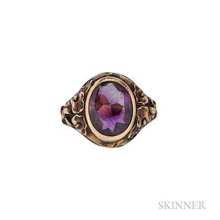 14kt Gold and Amethyst Ring, Tiffany & Co., dated 1924, with buff-top amethyst and chased and engraved floral shoulders, size