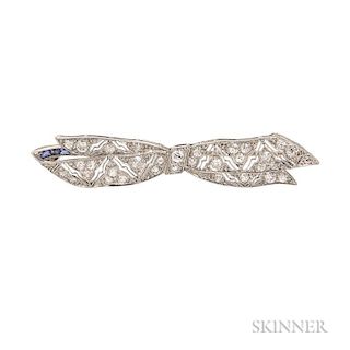 Art Deco Platinum and Diamond Bow Brooch, the finely pierced bow set with old European-cut diamonds, calibre-cut sapphire acc