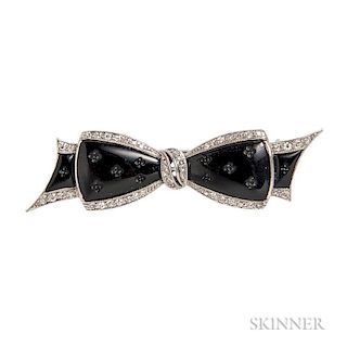 Art Deco Platinum, Onyx, and Diamond Bow Brooch, J.E. Caldwell & Co., the onyx with engraved accents, framed by single-cut di