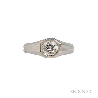 Art Deco Platinum and Diamond Solitaire, bead-set with a transitional-cut diamond weighing approx. 1.00 cts., millegrain acce