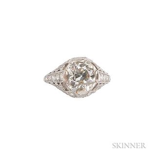 Art Deco Platinum and Diamond Ring, set with an old European-cut diamond weighing approx. 2.10 cts., in a pierced mount set w