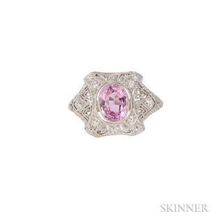 Art Deco Platinum, Pink Topaz, and Diamond Ring, set with an oval topaz, further set with old European-cut diamonds, in a fin