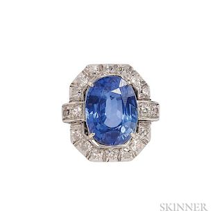 Platinum, Sapphire, and Diamond Ring, prong-set with an oval-cut sapphire measuring approx. 13.30 x 9.90 x 6.10 mm, and frame