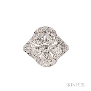 Art Deco Platinum and Diamond Ring, with flower motif, set with old European-cut diamonds, pierced mount, size 6.