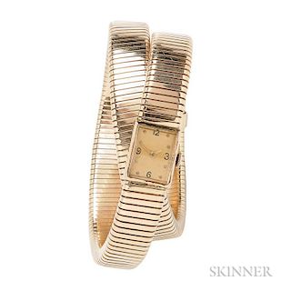 Retro Lady's 14kt Gold Tubogas Wristwatch, the double wrap tubogas bracelet with rectangular dial, manual-wind movement, 60.6