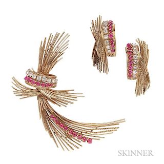 18kt Gold, Ruby, and Diamond Suite, comprising a brooch and earclips, each designed as a spray set with cabochon rubies and f