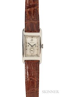 Platinum Wristwatch, Movado, Tiffany & Co., dated 1942, the silvertone metal dial with arabic and baton numeral indicators, s