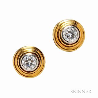 18kt Gold and Diamond Earstuds, each full-cut diamond in a platinum bezel, approx. total wt. 1.20 cts.