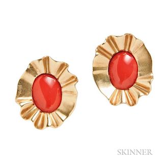 18kt Gold and Coral Earclips, Angela Cummings, each centering a coral cabochon, signed, lg. 1 1/4 in.