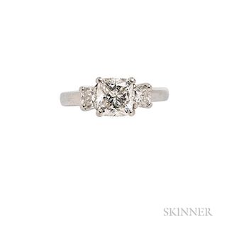 Platinum and Diamond Ring, centering a cushion brilliant-cut diamond weighing approx. 1.13 cts., flanked by cushion brilliant