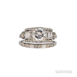 Platinum and Diamond Ring, c. 1950, centering a prong-set transitional-cut diamond weighing approx. 1.30 cts., flanked by bag