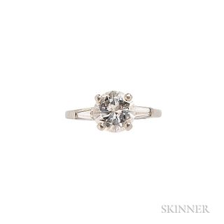 Platinum and Diamond Solitaire, prong-set with a full-cut diamond weighing approx. 1.86 cts., flanked by tapered baguettes, s