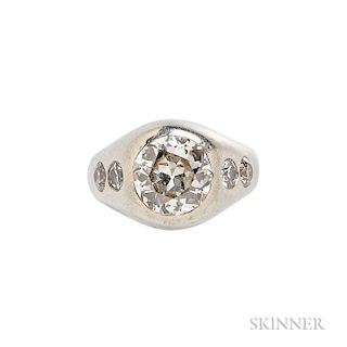 Diamond Ring, centering a flush-set old European-cut diamond weighing approx. 3.15 cts., flanked by flush-set old European-cu