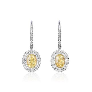 A Pair of Yellow and White Diamond Drop Earrings, with a GIA Report