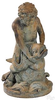 Patinated bronze boy and fish fountain