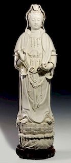 A LARGE CHINESE BLANC-DE-CHINE GUANYIN, 43-INCHES