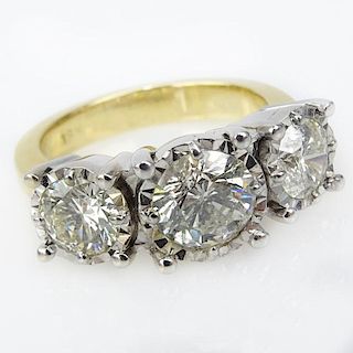 Vintage Approx. 3.10 Carat Round Brilliant Cut Diamond and 18 Karat Yellow and White Gold Three Stone Ring Set with an Approx