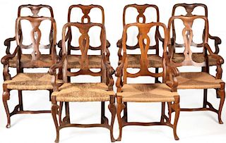A SET OF EIGHT 20TH C. PROVINCIAL ARM CHAIRS