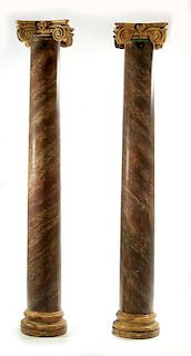 A GOOD PAIR 95 -INCH CARVED AND FAUX MARBLE COLUMNS