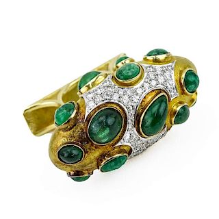 Circa 1968 Roger Lucas (20th century) Montreal, Canada Approx. 16.0-18.0 Carat Sixteen (16) Cabochon Colombian Emerald, 5.5-6